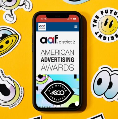 Smartphone displaying the American Advertising Awards webpage featuring ASCO.
