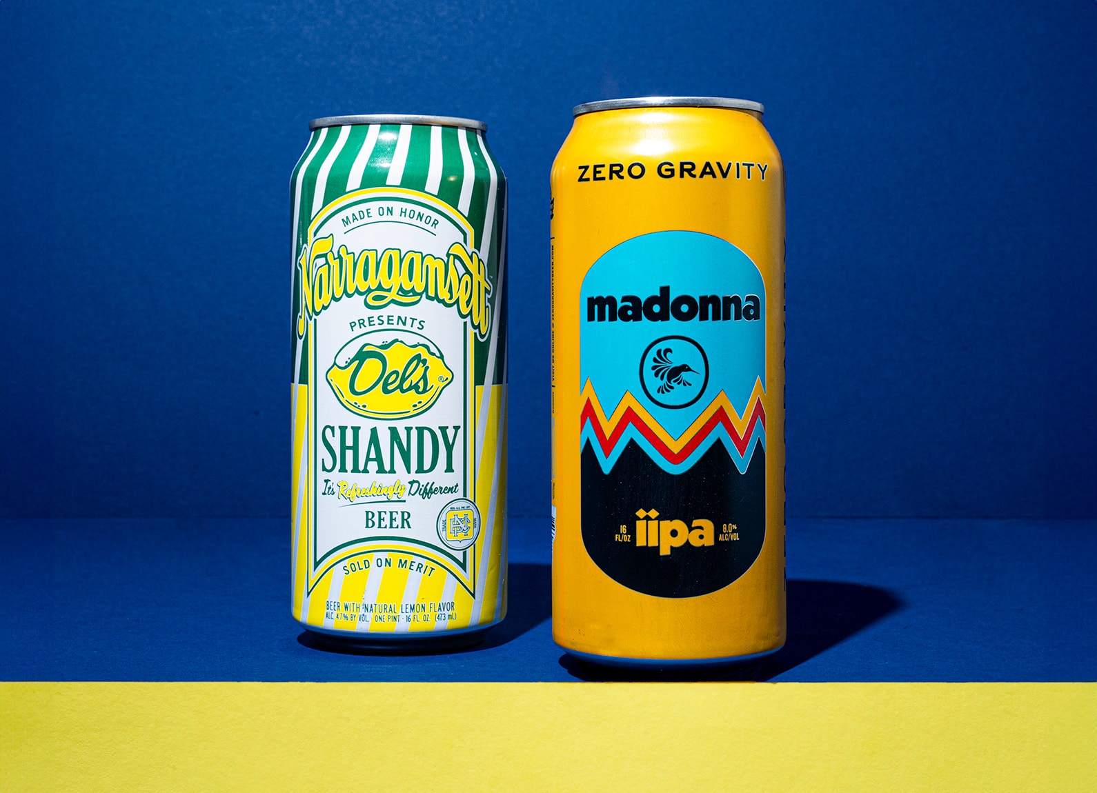 Two beer cans with retro designs