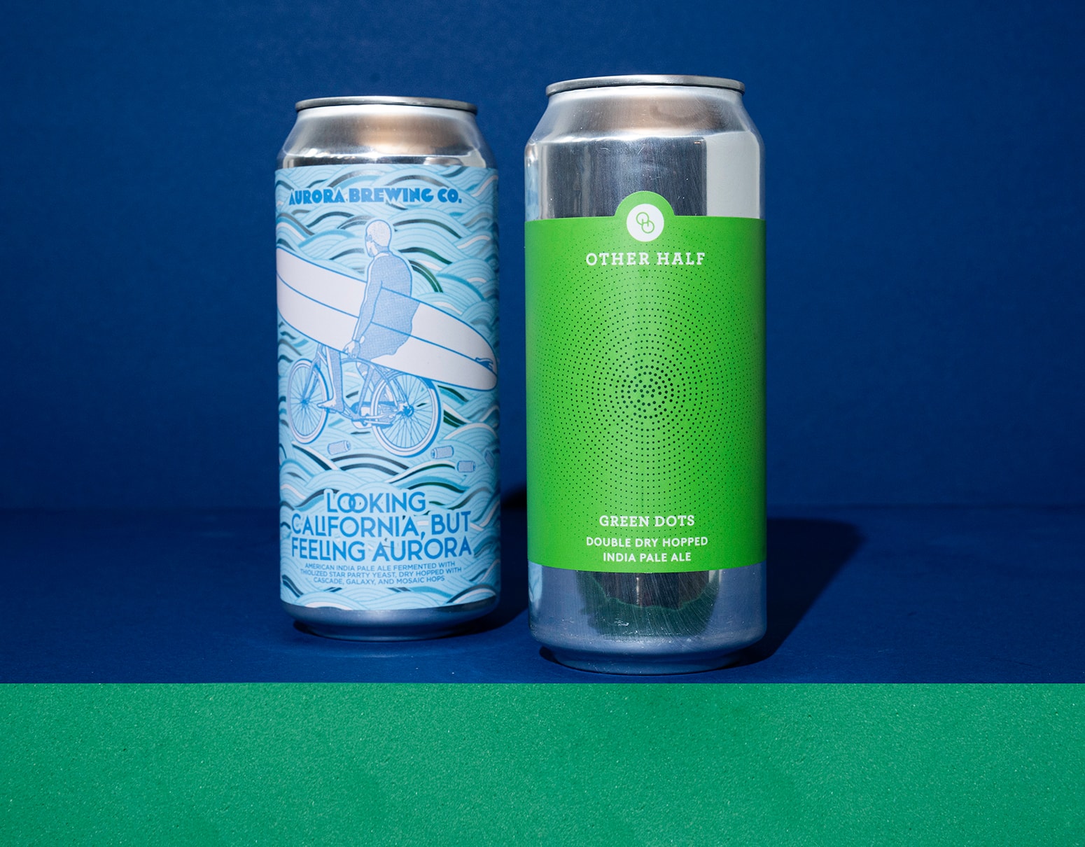 Two beer cans with minimalist label designs.